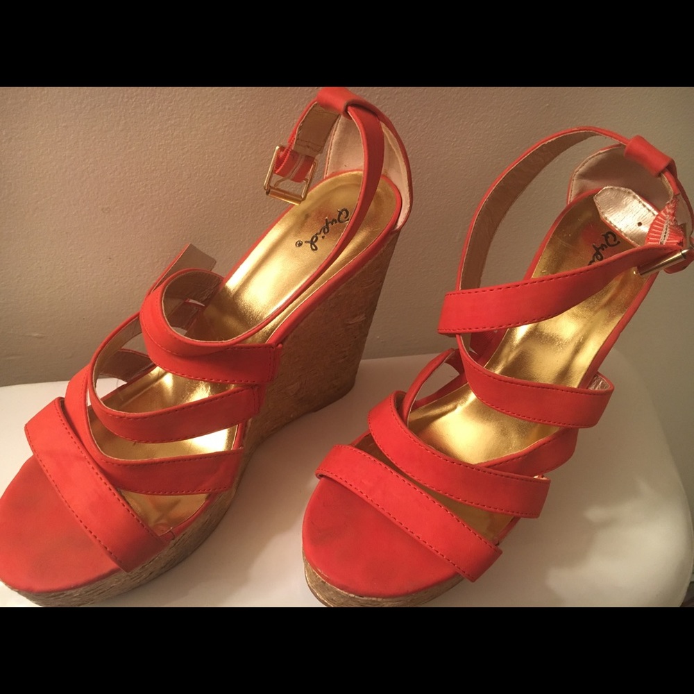 Women’s size 10 orange wedges